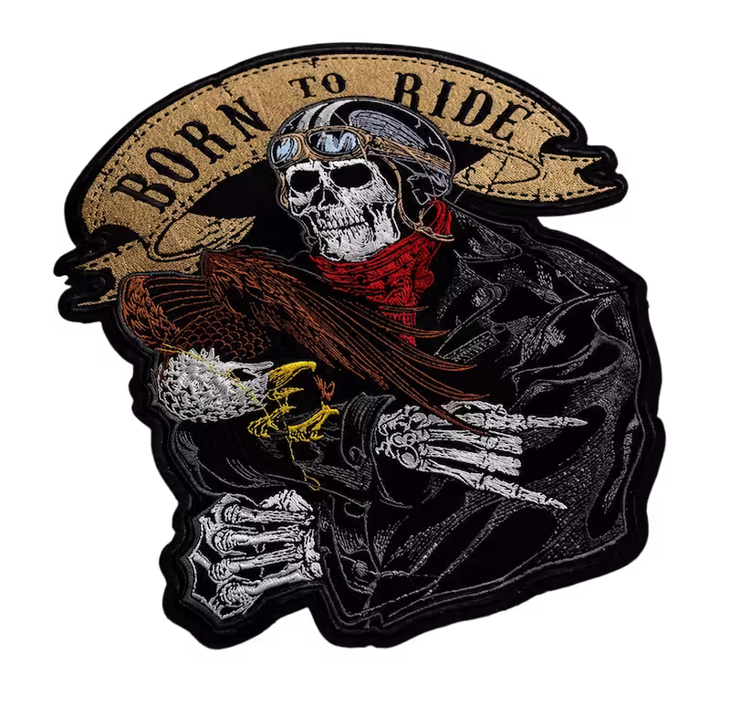 Born to Ride embroidered biker patch featuring a skeleton in a helmet and goggles holding an eagle.