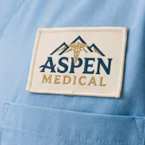 Soft custom patch on blue medical scrubs.