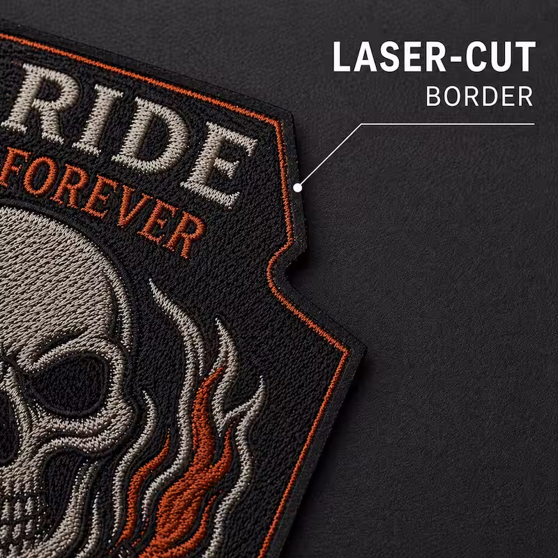 Close-up of an embroidered Ride Forever skull patch, highlighting its precise, custom laser-cut border.